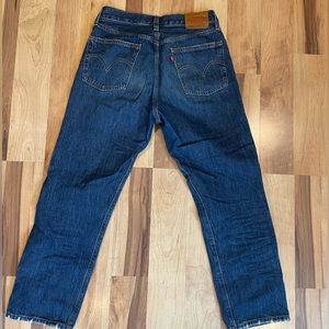 Levi 501 rib cage cropped pant with slight distressing. Size 27.